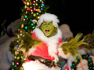 This undated photo courtesy of Universal Studios Hollywood shows a performance during the Grinchmas festivities at Universal Studios Hollywood in Universal City, Calif. From gingerbread exhibits to the Grinch to a new Louisville, Ky., attraction called KaLightoscope, destinations around the country are offering Christmas-themed attractions and fun. (AP Photo/Universal Studios Hollywood) NO SALES Travel Trip Christmas Attractions Travel_Trip_Christmas_Attractions_NYLS522.jpg